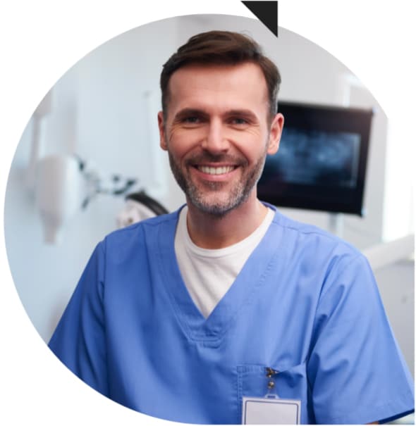 Male veterinarian smiling