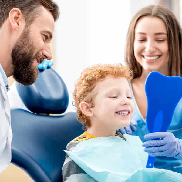 dentist working on kid
